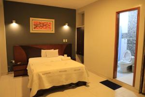 Cama o camas de una habitación en Hotel Vicente de la Vega