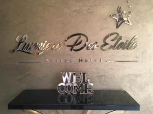 a sign for a wellness department at a wellness hotel at Lumiere Des Etoile in Kuwait