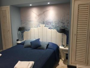 Da ö Vittorio SRL客房内的一张或多张床位