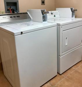 two white appliances sitting next to each other at The Noor Hotel in Torrey