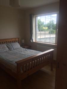 Postel nebo postele na pokoji v ubytování 39 woodview
