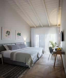 מיטה או מיטות בחדר ב-ניר עציון Resort