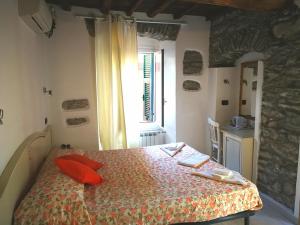 A bed or beds in a room at Locanda Ca Dei Duxi