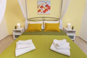 Кровать или кровати в номере Lumia e Zagara