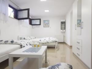 Posteľ alebo postele v izbe v ubytovaní Apartman Maksimir Relax Zagreb-75m2