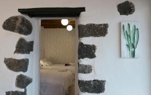 Posteľ alebo postele v izbe v ubytovaní Casa Valeria
