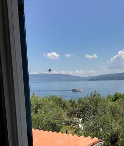 a view of the water from a window at Sea-esta 1 in Valun