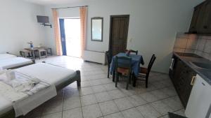 Postel nebo postele na pokoji v ubytování Hotel Zeus