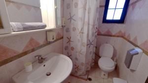 Koupelna v ubytování Hotel Zeus