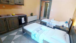 Postel nebo postele na pokoji v ubytování Hotel Zeus