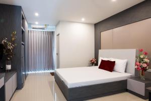 เตียงในห้องที่ DB Plus 5