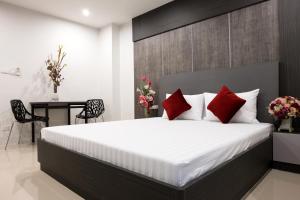 เตียงในห้องที่ DB Plus 5