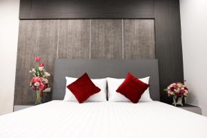 เตียงในห้องที่ DB Plus 5