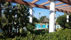 サン・ルイス・デ・サビニリャスにあるÁtico en La Noria, piscina privada en primera línea de playa.のギャラリーの写真