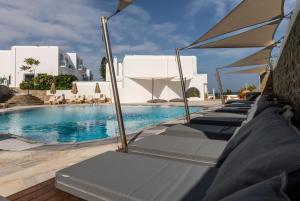 The swimming pool at or close to Poseidon Hotel Suites