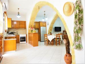 A kitchen or kitchenette at Traditional Cretan Villa