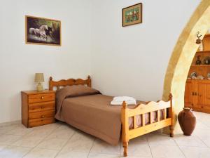 A bed or beds in a room at Traditional Cretan Villa