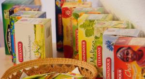 a bunch of cereal boxes sitting next to a basket at Lüch da Spescia in La Valle