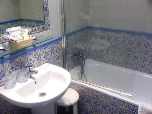 Ванная комната в Hotel Goya