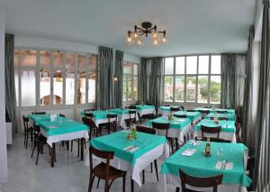 En restaurant eller et andet spisested på Hotel Residence Villa Teresa