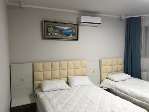 Postel nebo postele na pokoji v ubytování Villa Mariana