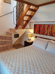 A bed or beds in a room at La Villa