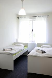 Postel nebo postele na pokoji v ubytování Jcamp + 37 fotografií