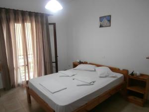 Voodi või voodid majutusasutuse Hotel Aris toas