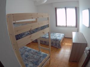 Postel nebo postele na pokoji v ubytování Gli Ulivi di Nesso