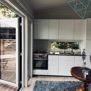 Kuchyň nebo kuchyňský kout v ubytování Compact living home, DOWNSIZING PROJECT