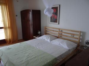 Postel nebo postele na pokoji v ubytování Apartments Bassi