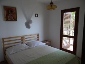 Postel nebo postele na pokoji v ubytování Apartments Bassi