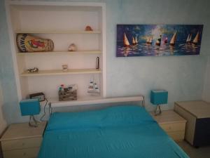 A bed or beds in a room at Housesanremo