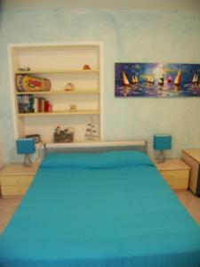 A bed or beds in a room at Housesanremo