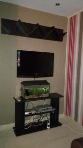 TV a/nebo společenská místnost v ubytování Happy House Ennasr