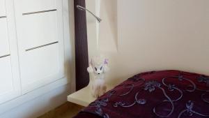 Postel nebo postele na pokoji v ubytování Happy House Ennasr
