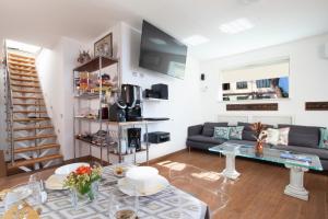 A television and/or entertainment centre at La Terrazza 38
