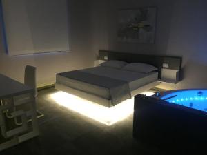 Postel nebo postele na pokoji v ubytování Kalì B&B