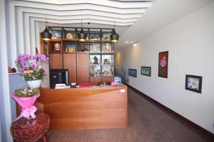 a shop with a reception desk in a room at Kenting Waterfront Hotel in Kenting