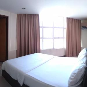Starview Hotel客房内的一张或多张床位
