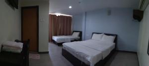 Starview Hotel客房内的一张或多张床位