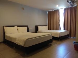 Starview Hotel客房内的一张或多张床位