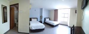 Starview Hotel客房内的一张或多张床位