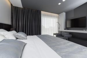 Posteľ alebo postele v izbe v ubytovaní Artis accommodation