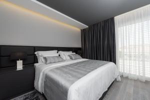 Posteľ alebo postele v izbe v ubytovaní Artis accommodation