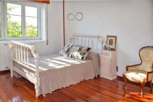 Postel nebo postele na pokoji v ubytování Casa de Torres