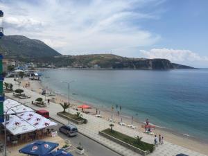 a view of a beach with people and the ocean at Sulaj Sea view 2 in Himare
