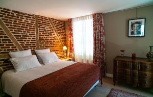 New Cottage & spa de nage Guesthouse客房内的一张或多张床位