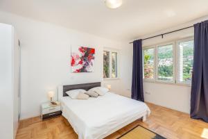 Posteľ alebo postele v izbe v ubytovaní Downtown Serenity House