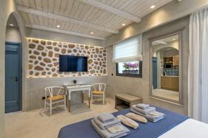 Posteľ alebo postele v izbe v ubytovaní Estia Boutique Apartments